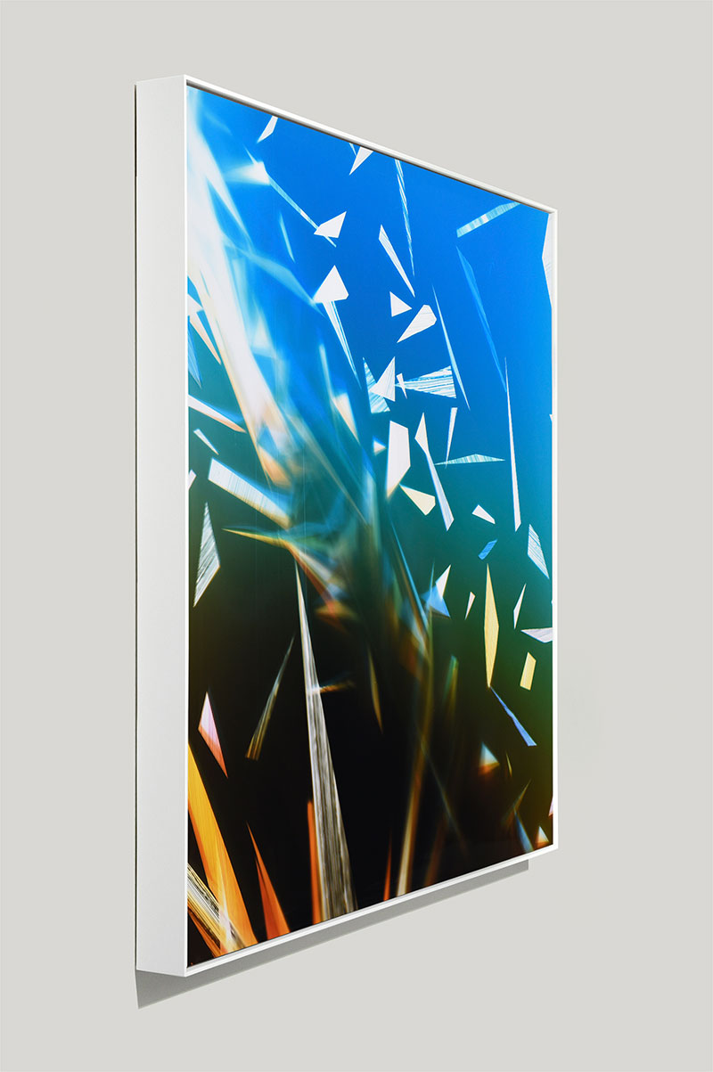 side view of color photogram titled: Airless-Weight from the series Precariously Bright