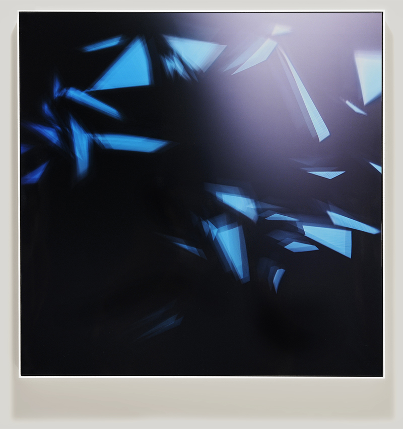 Framed color photogram titled, Embers Anew using analog photography
