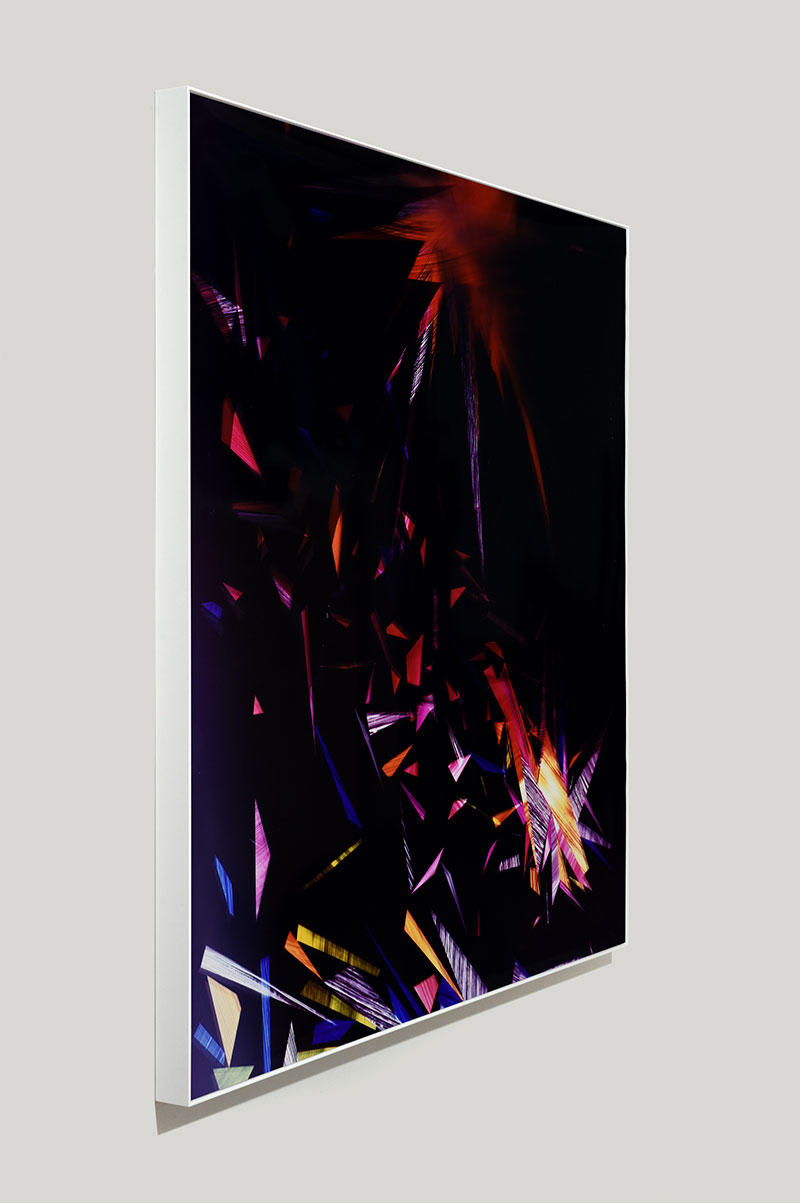 side view of framed color photogram titled: Variable Reentry from the series Precariously Bright